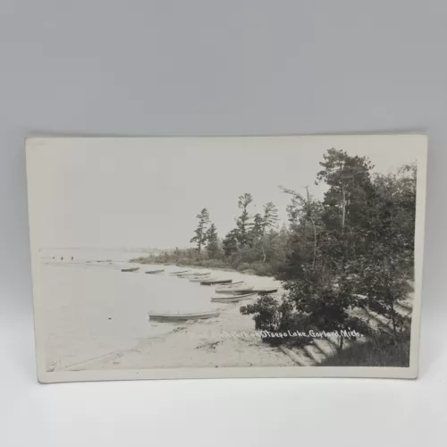A postcard image of Ostego Lake State Park.